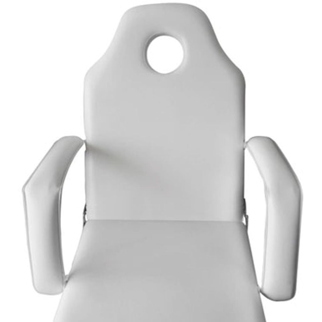 White treatment chair with ajustable legrests